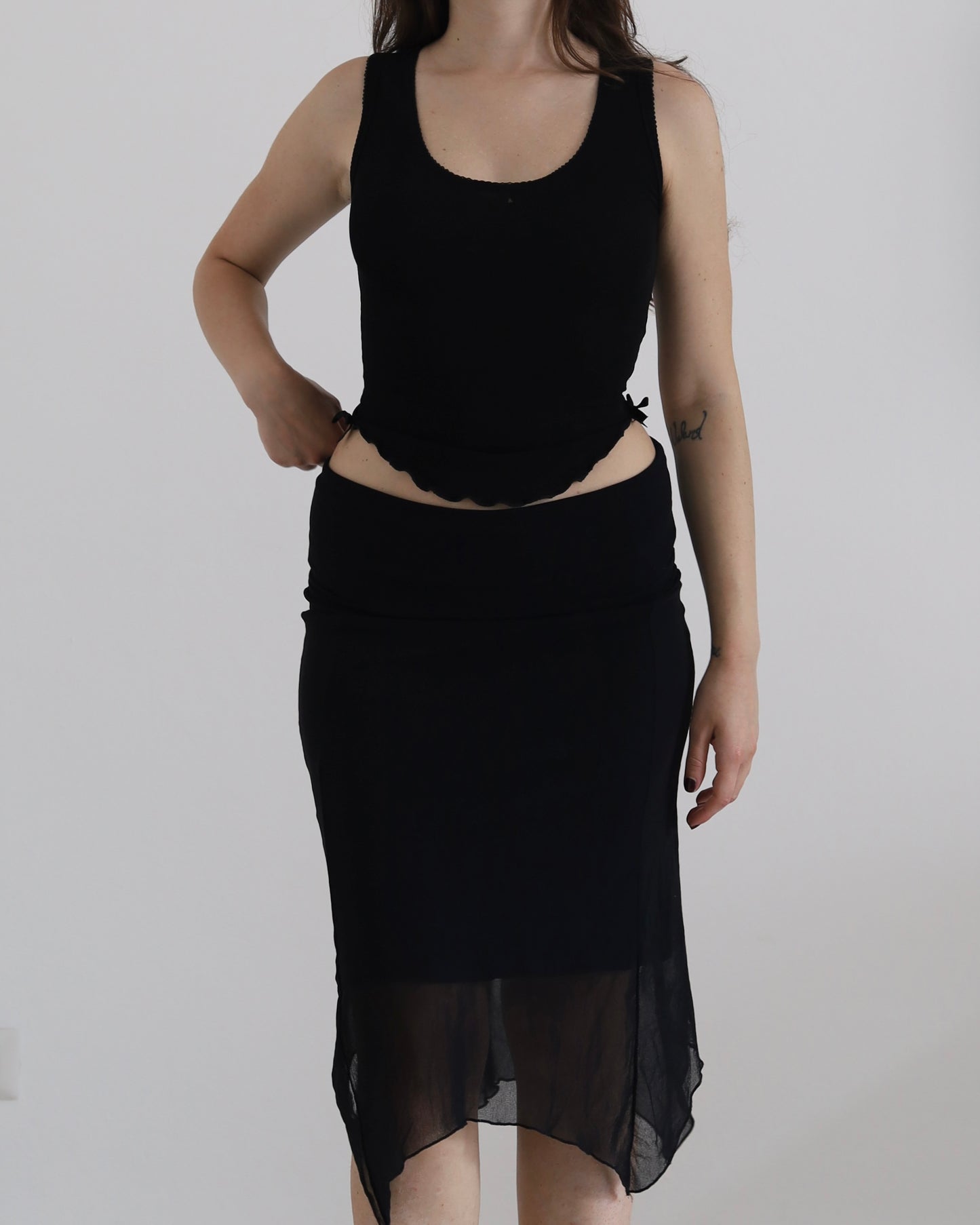 Asymmetric micro mesh skirt