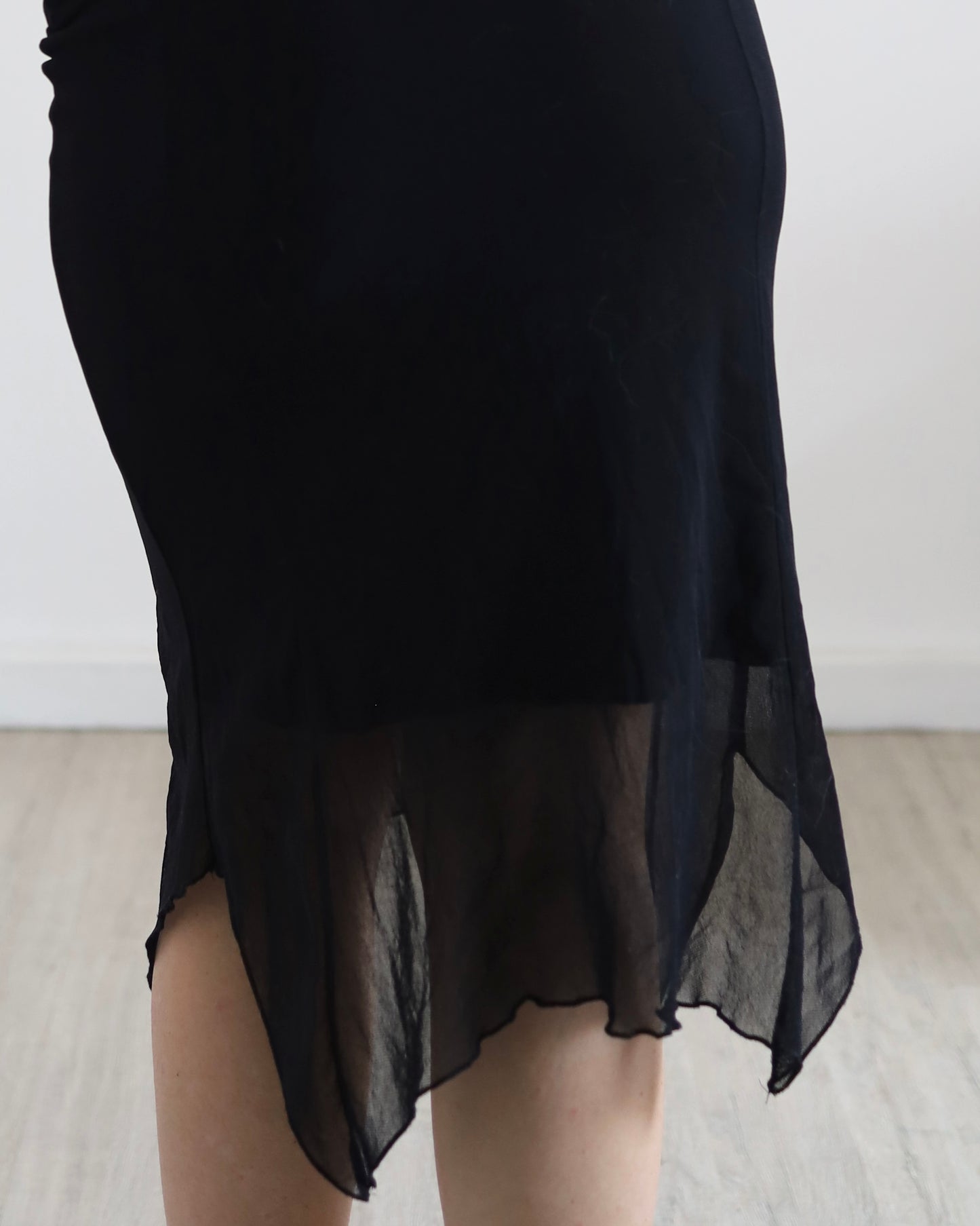 Asymmetric micro mesh skirt