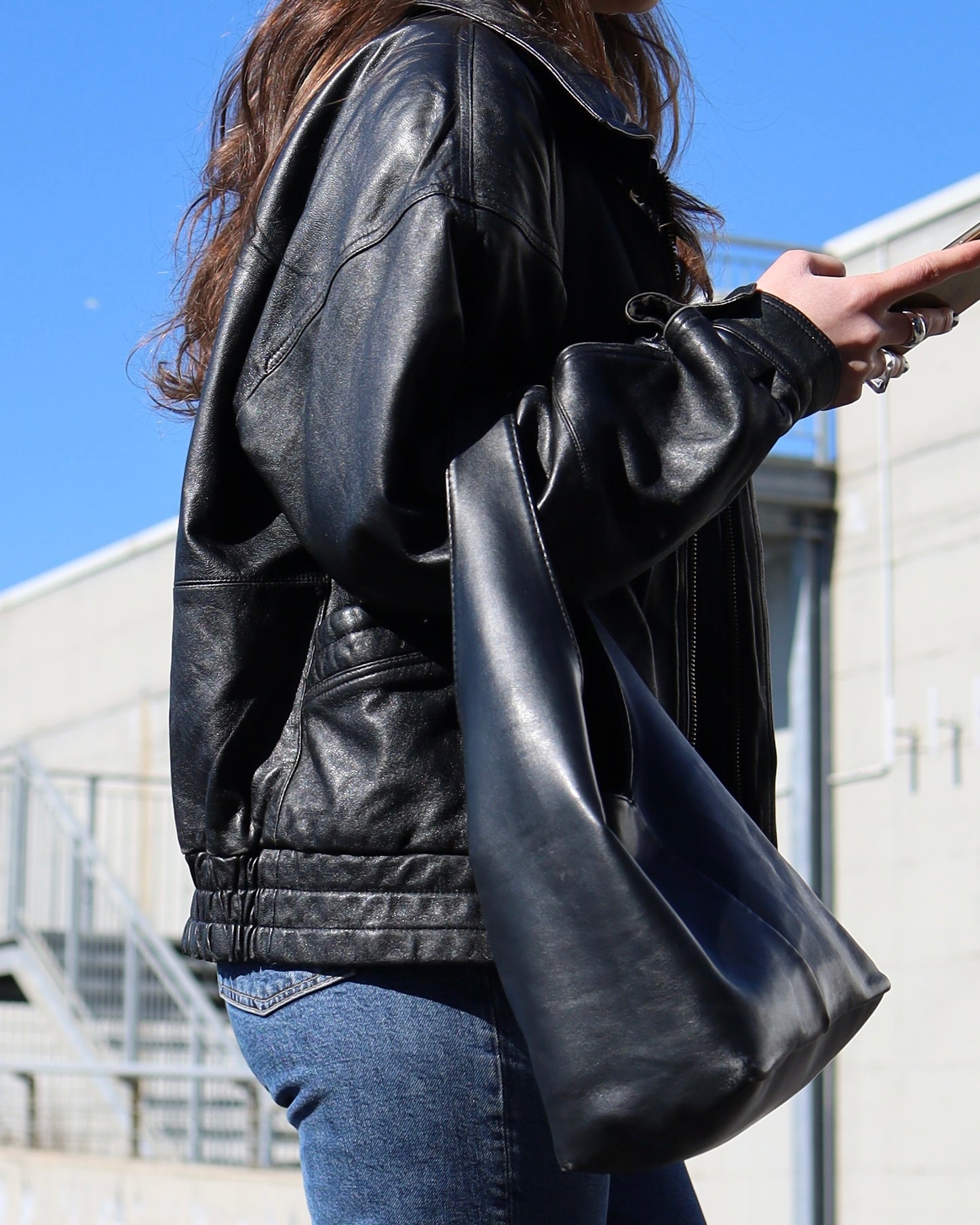 Black leather bomber jacket