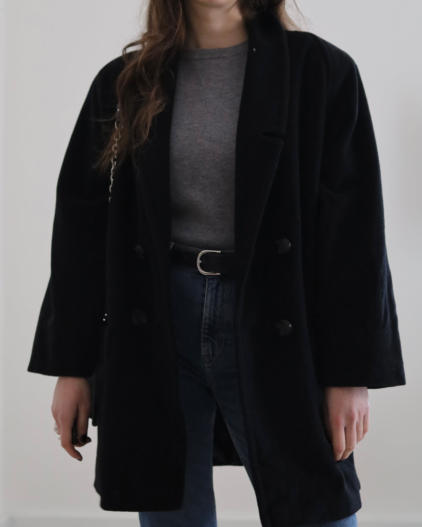 Manteau noir en laine à double boutonnage