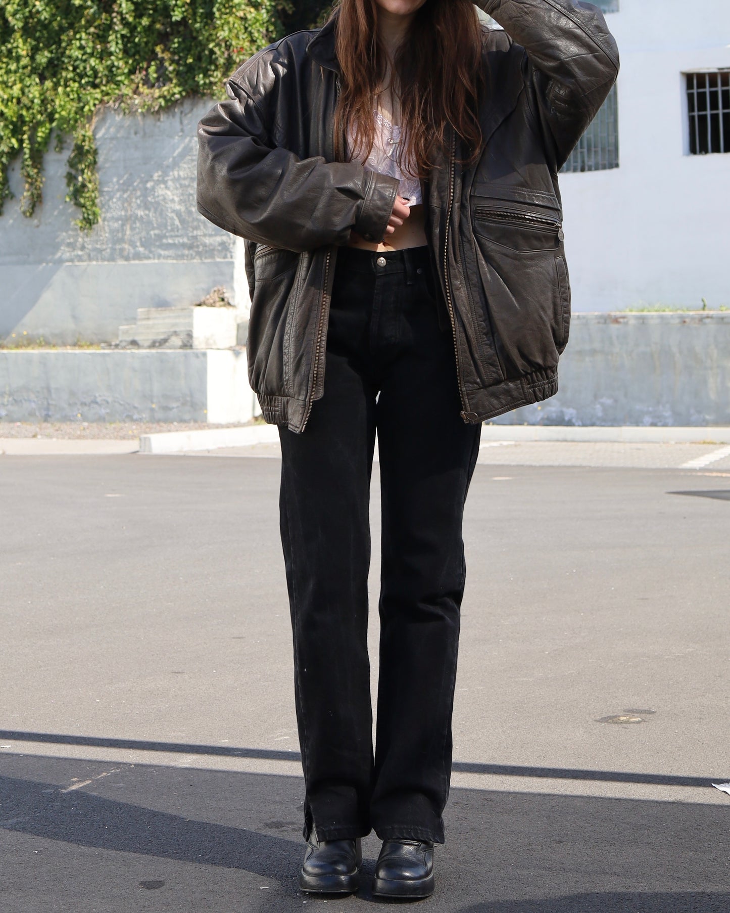 Brown leather bomber jacket