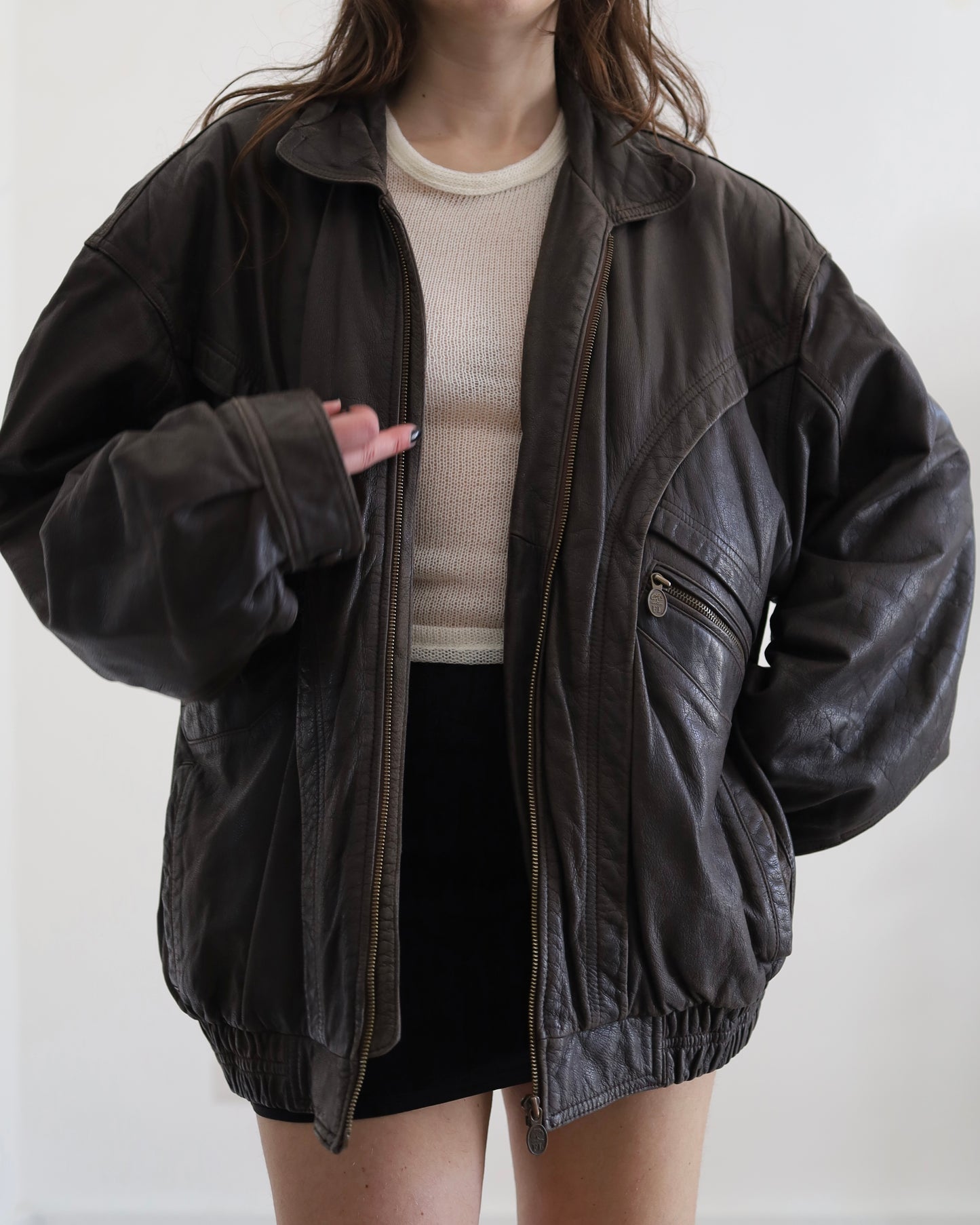 Brown leather bomber jacket