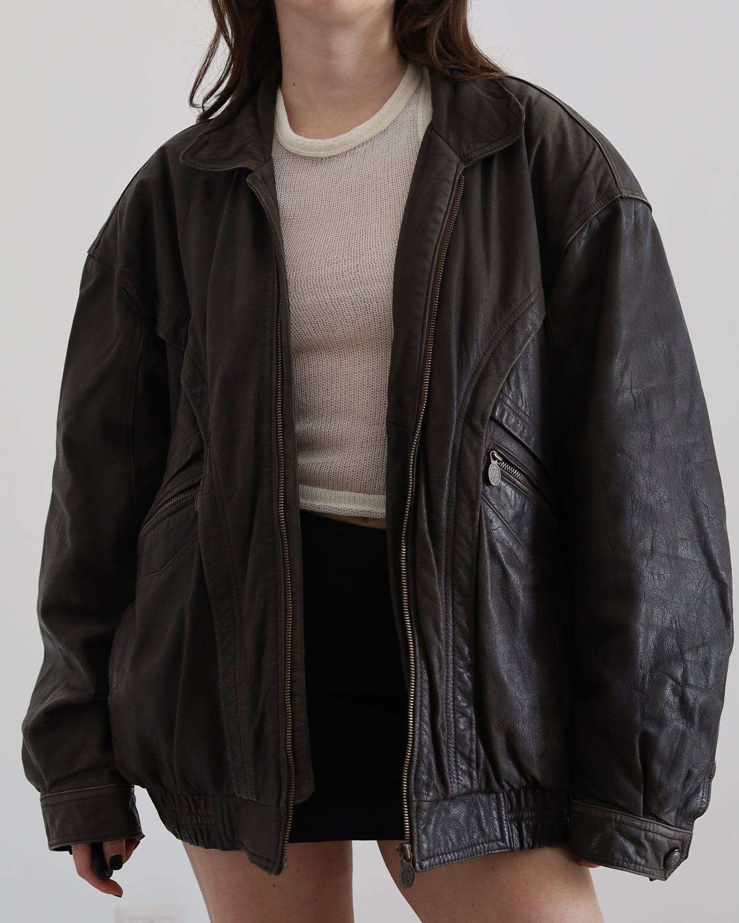 Brown leather bomber jacket