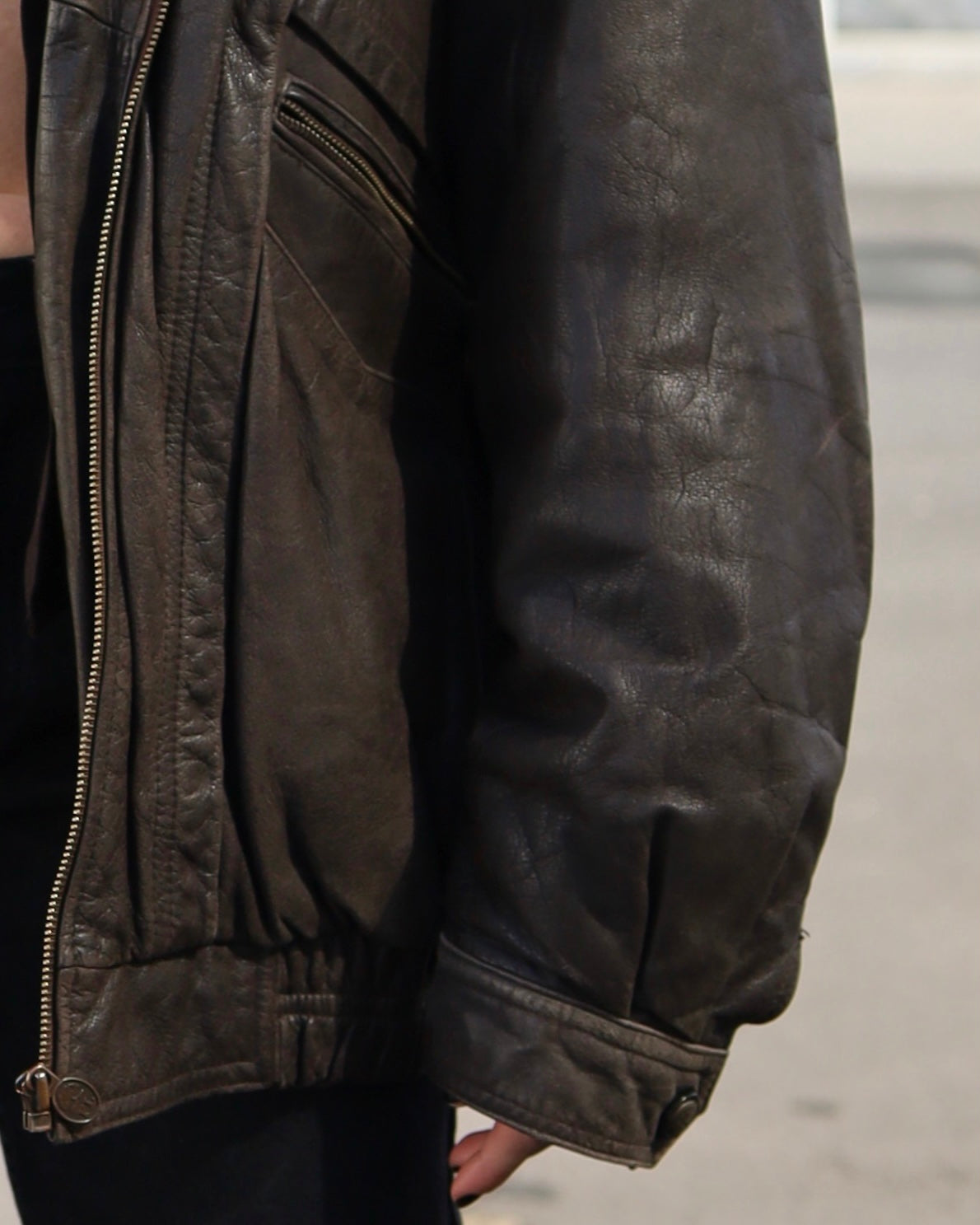 Brown leather bomber jacket