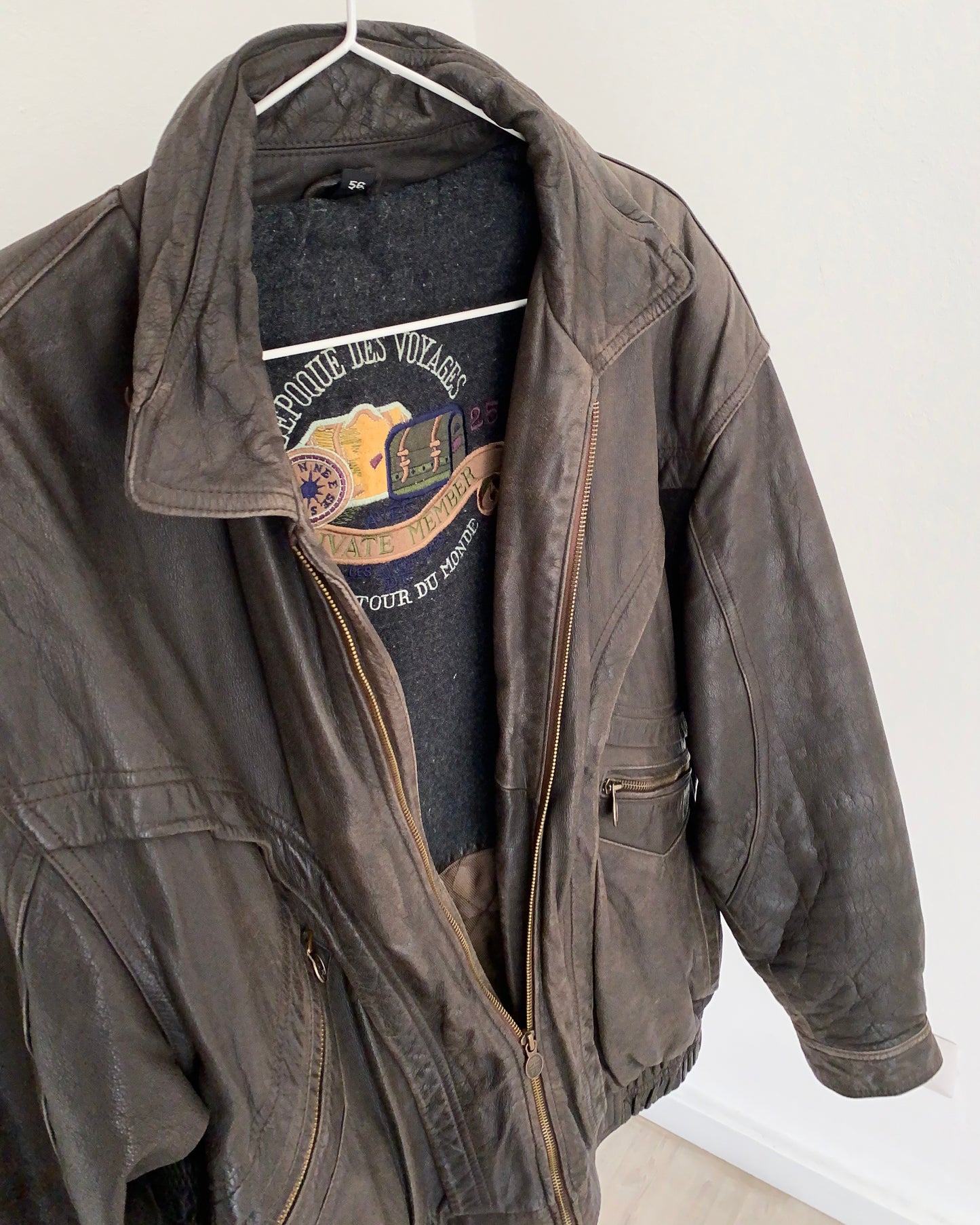 Brown leather bomber jacket