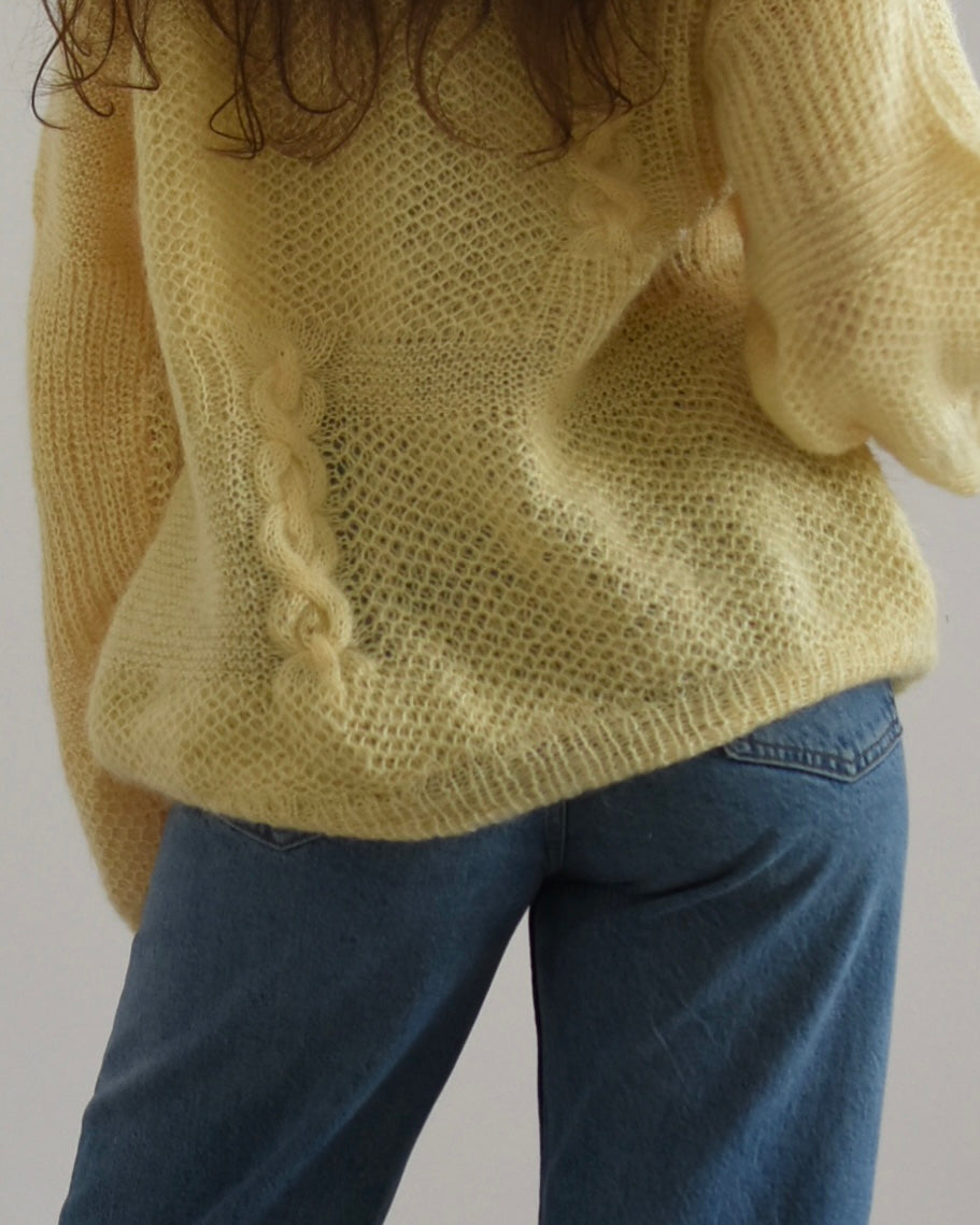 Knitted yellow jumper