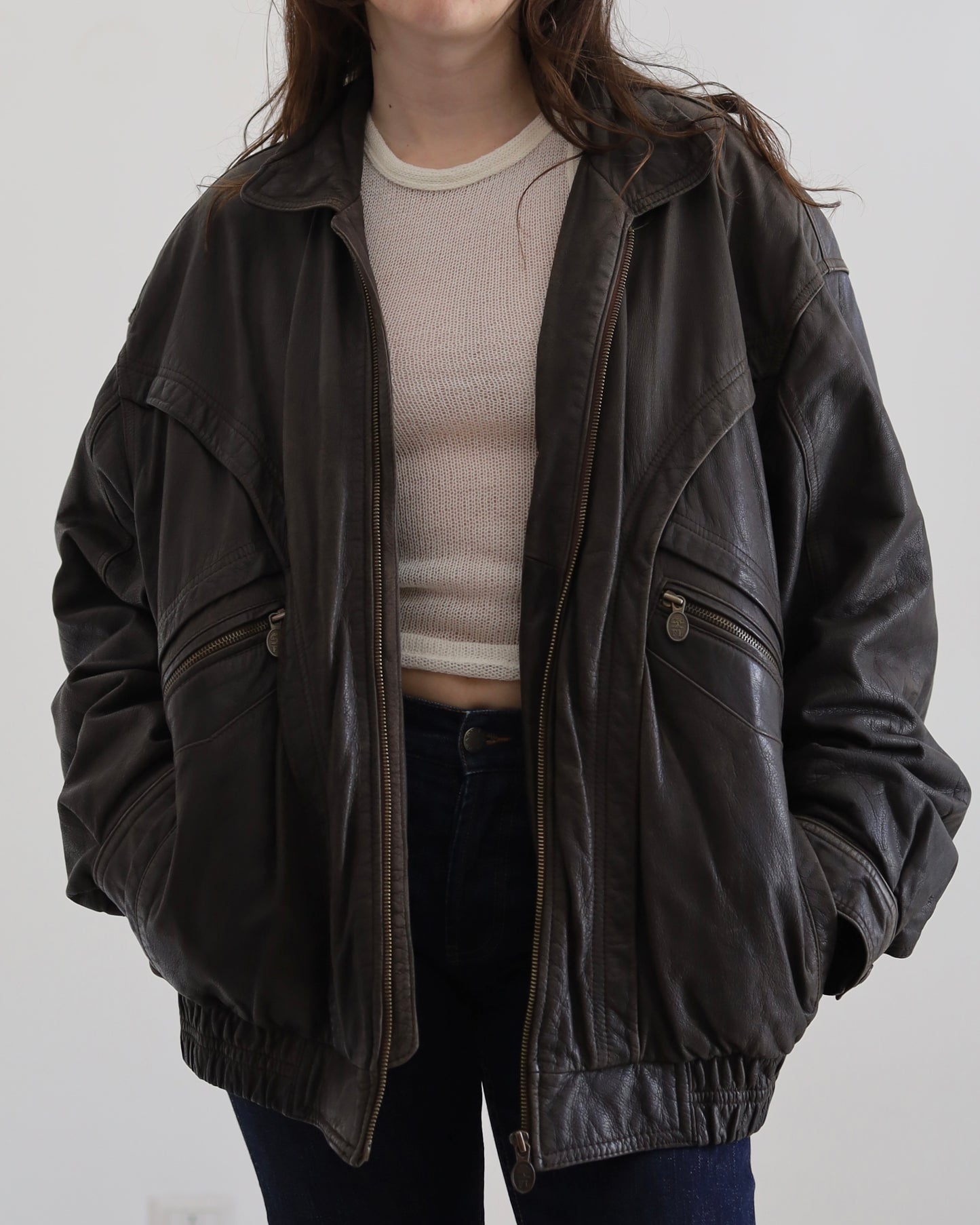 Brown leather bomber jacket