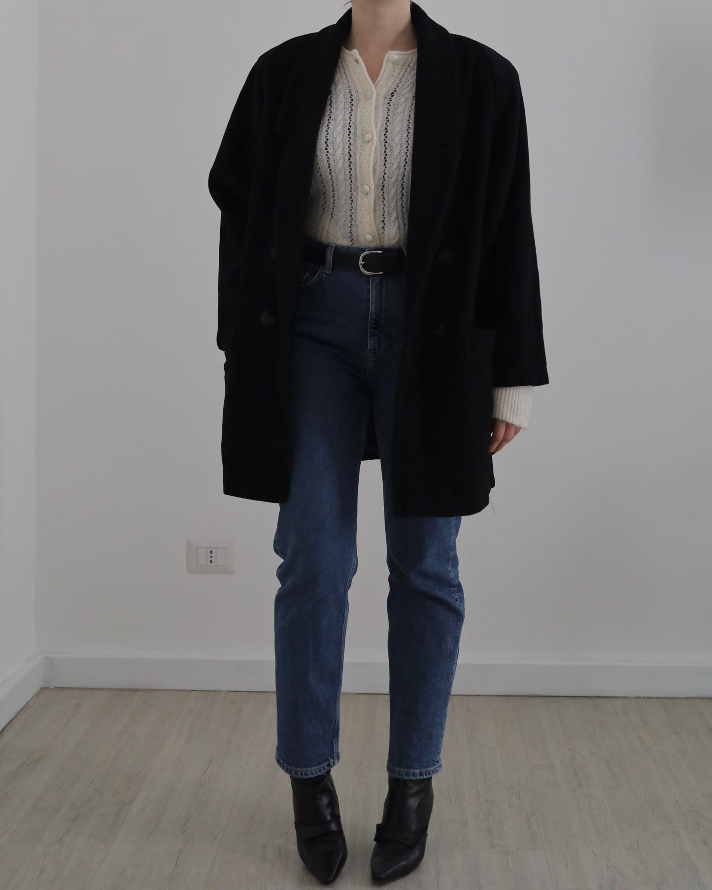 Manteau noir en laine à double boutonnage