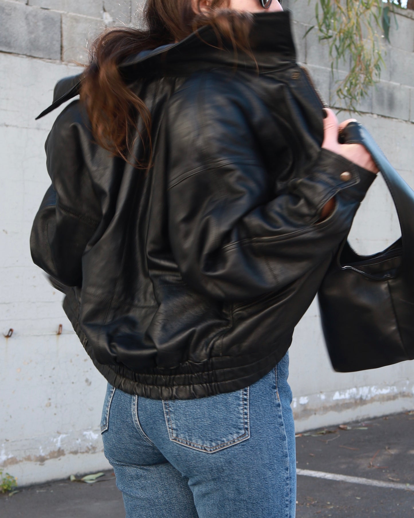 Black leather bomber jacket