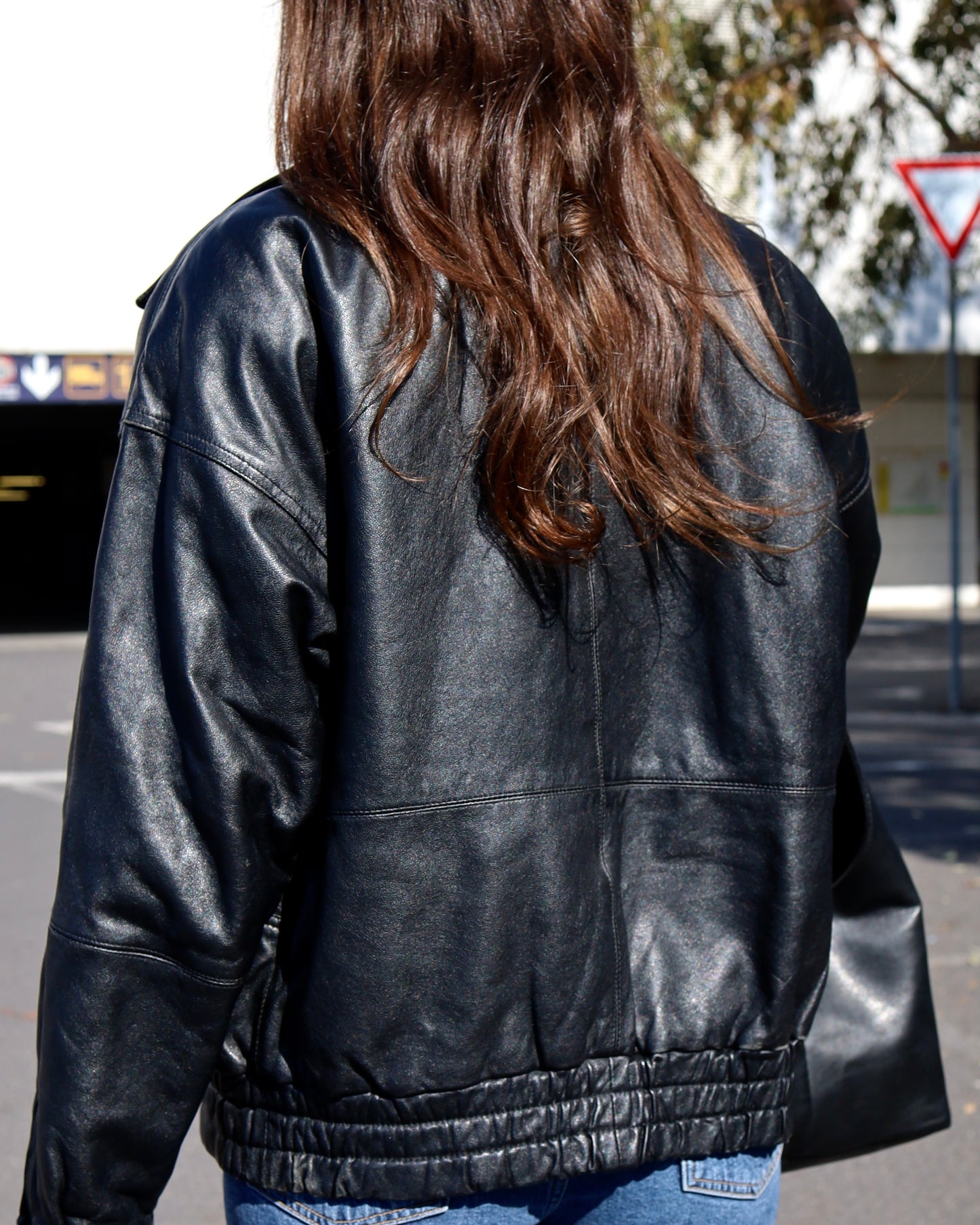 Black leather bomber jacket