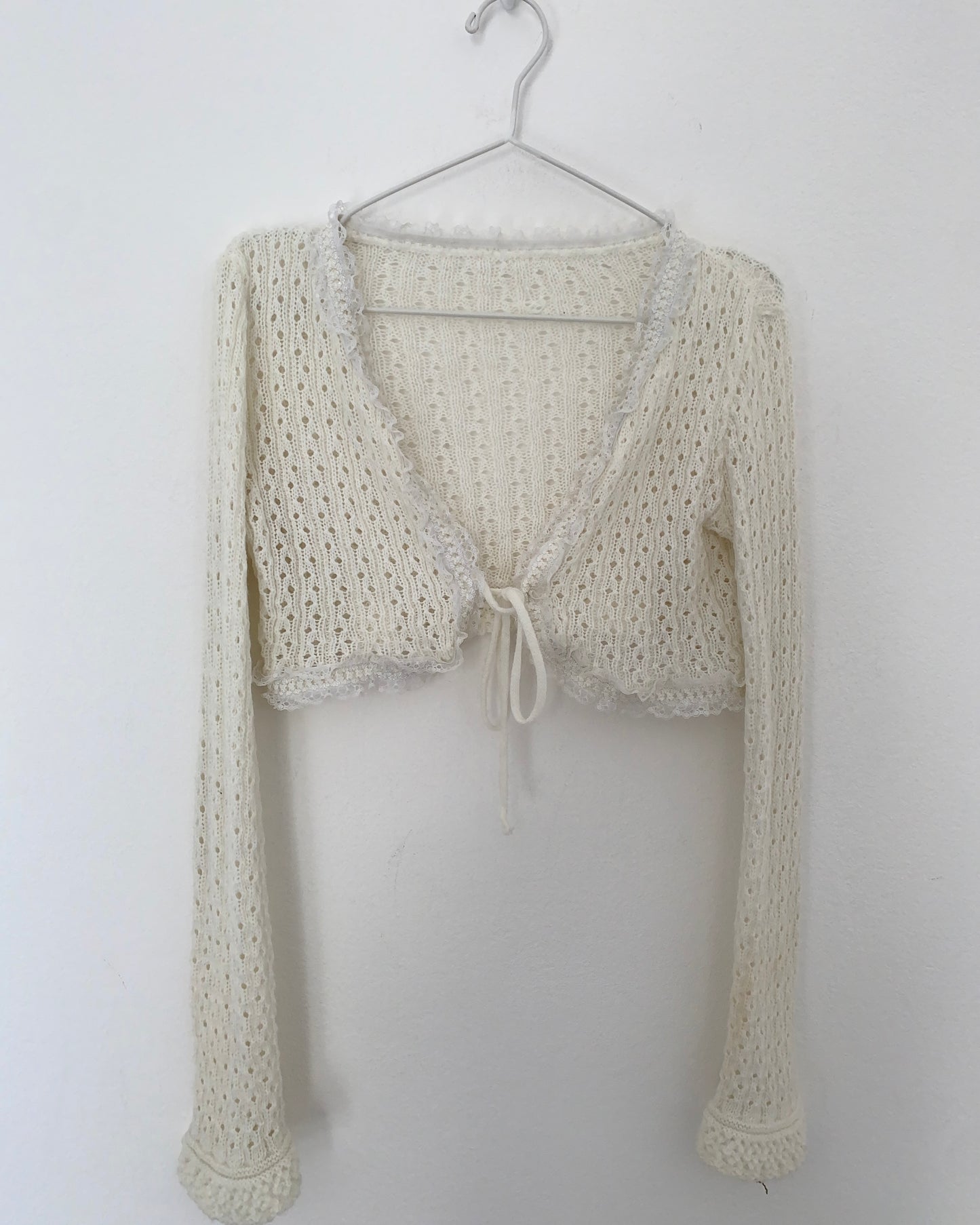 Micro cardigan en maille pointelle