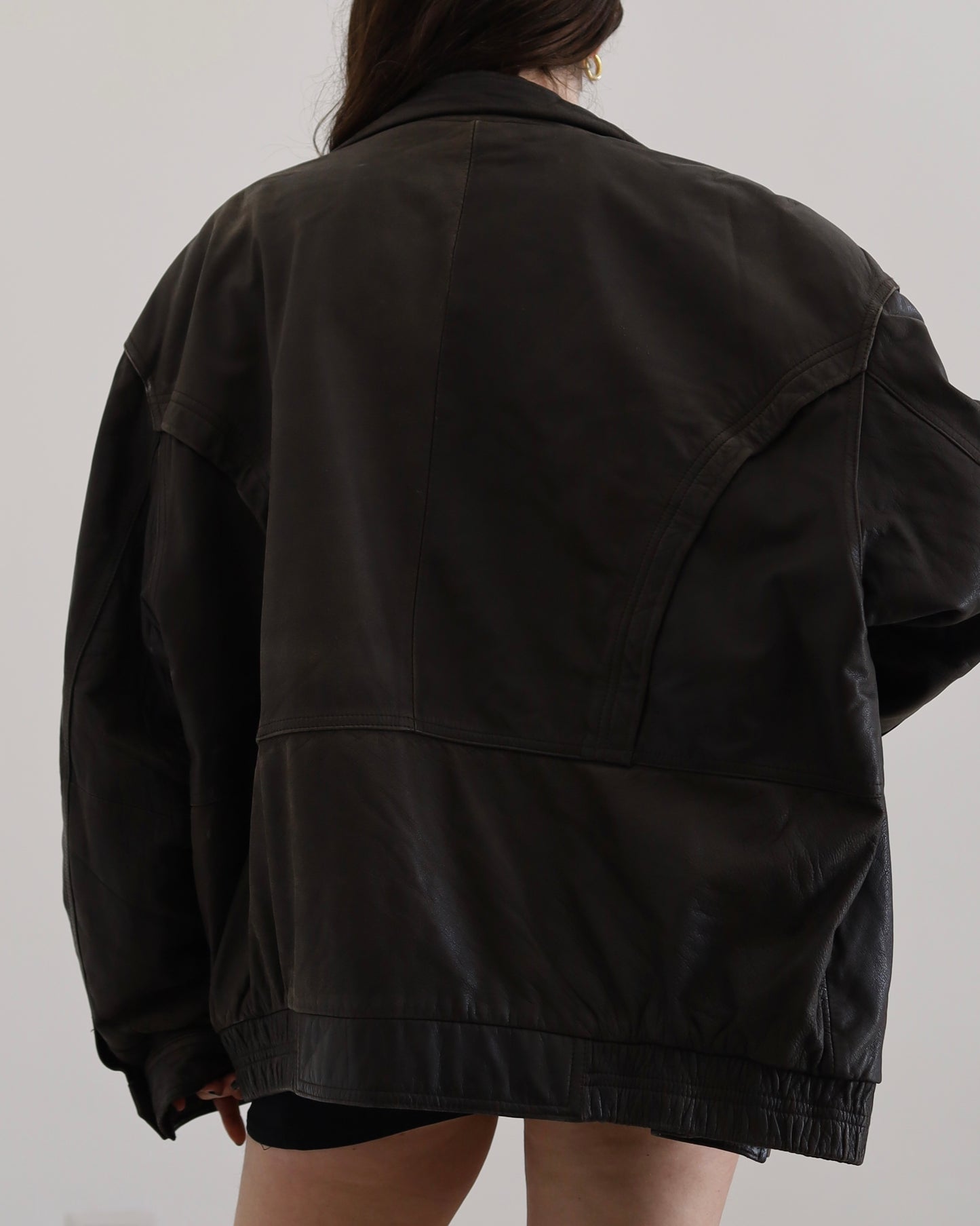 Brown leather bomber jacket