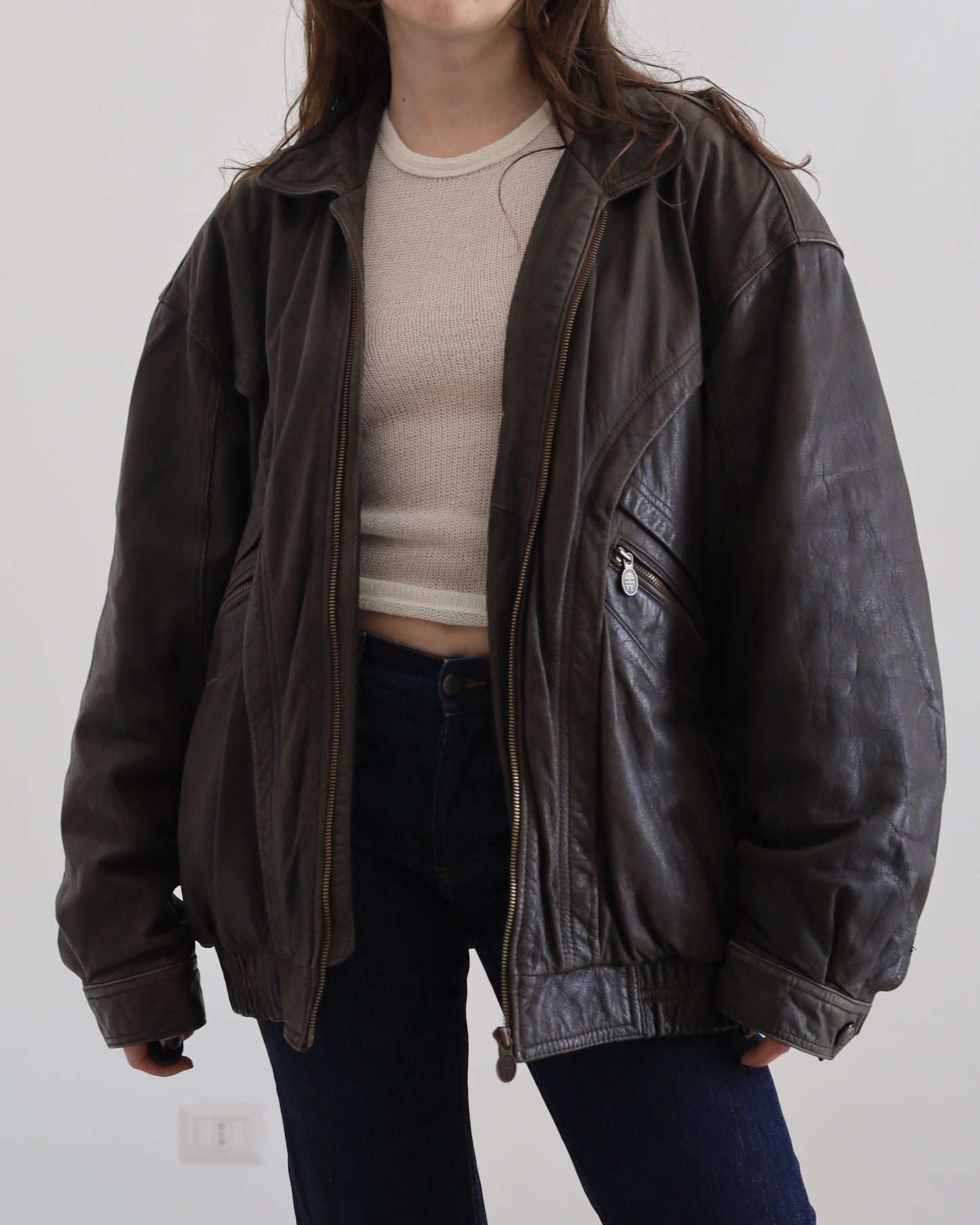 Brown leather bomber jacket