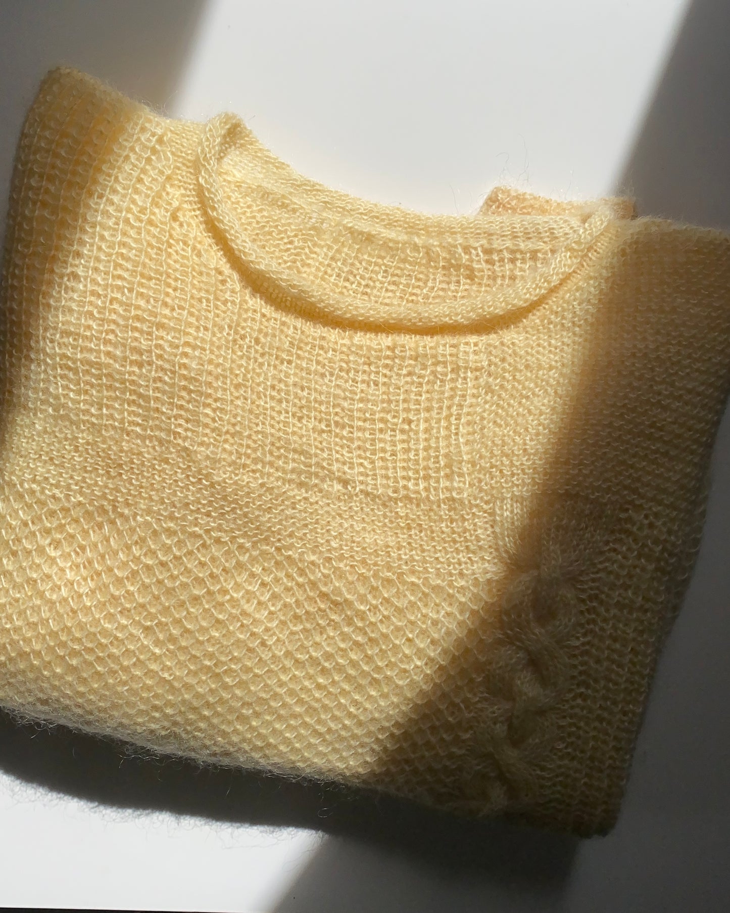 Knitted yellow jumper