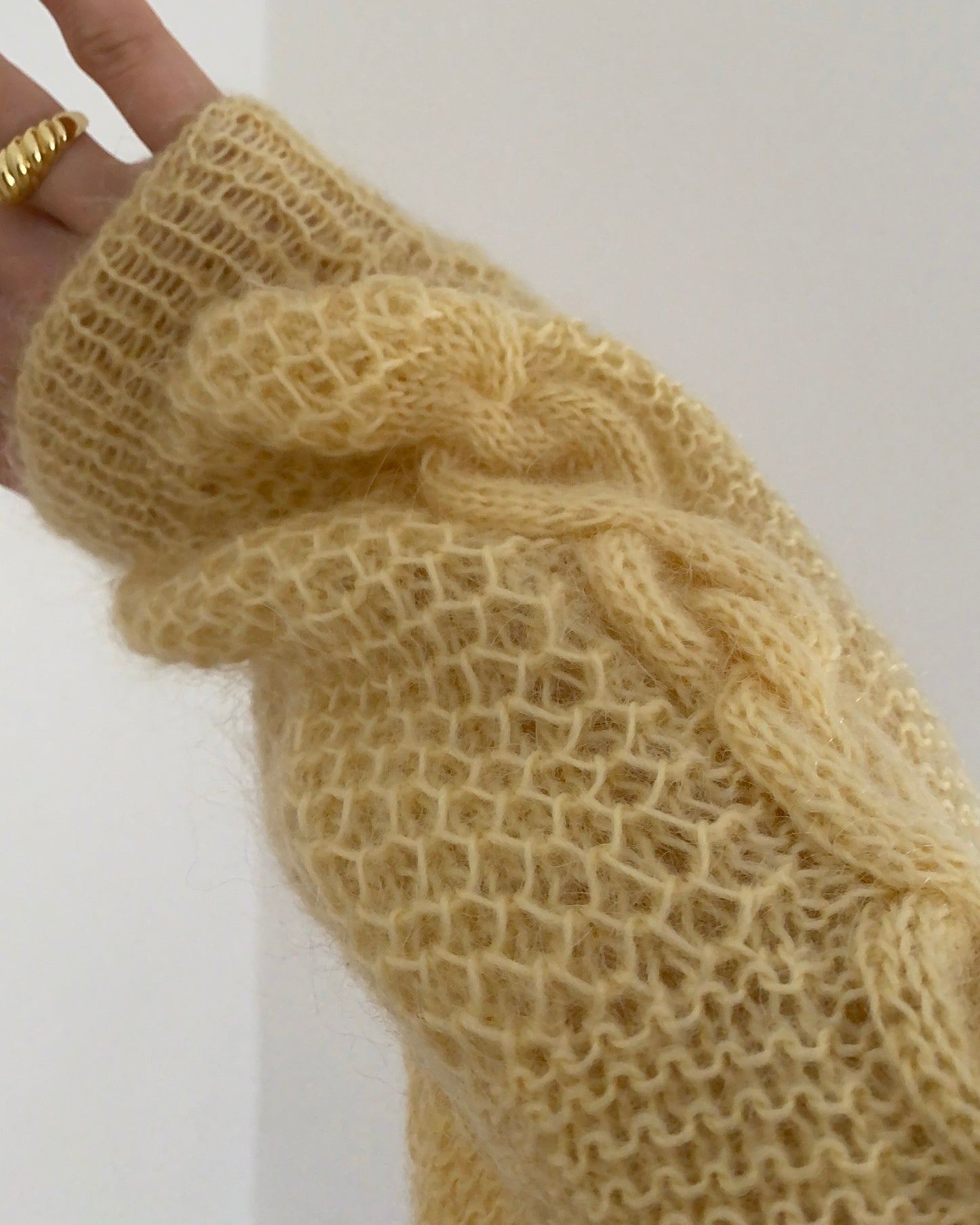 Knitted yellow jumper