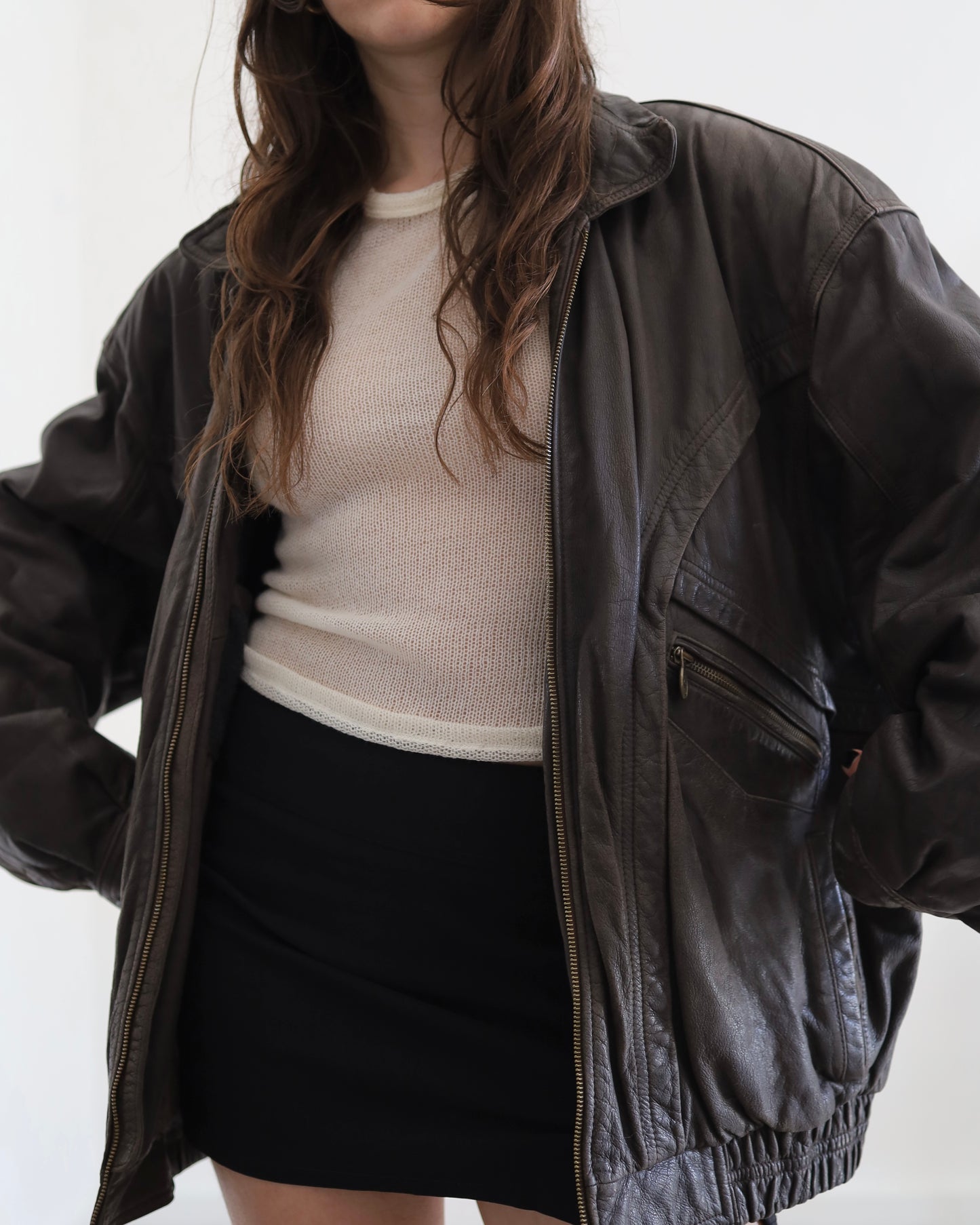 Brown leather bomber jacket