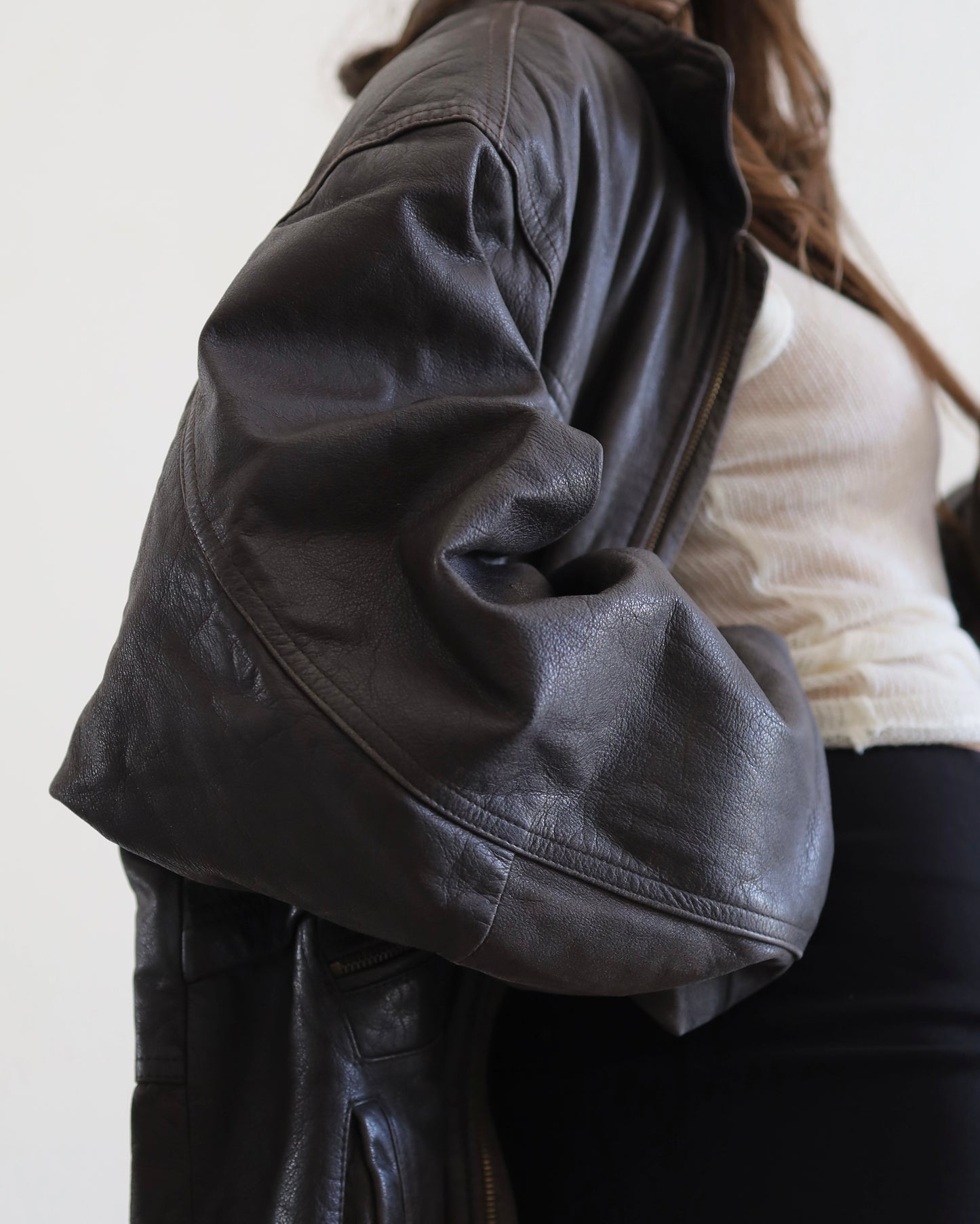 Brown leather bomber jacket